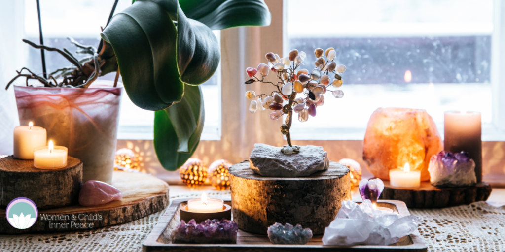 A table of crystals and candles