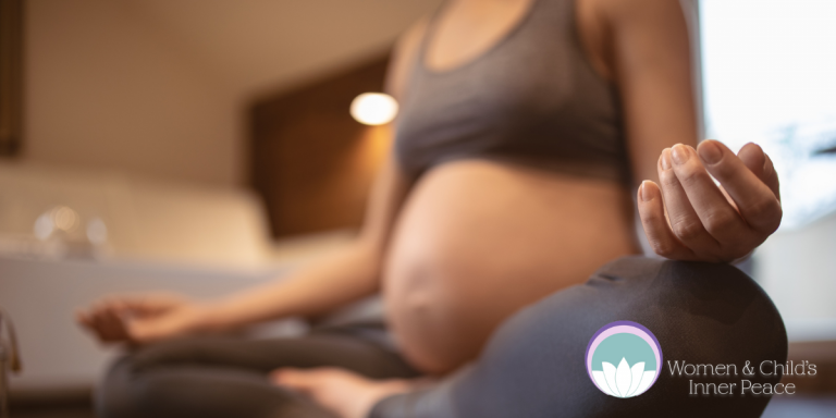 Pregnant woman meditating to reduce anxiety naturally