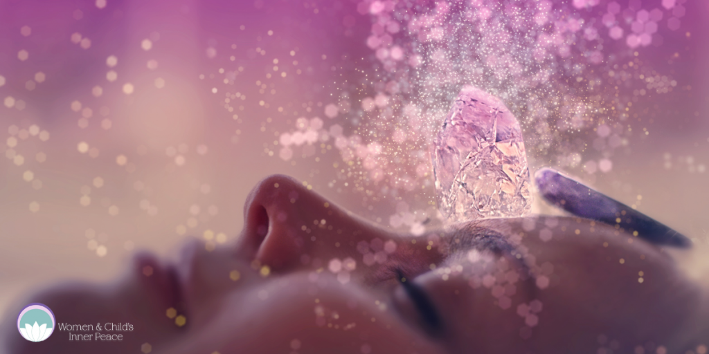 Woman receiving crystal healing